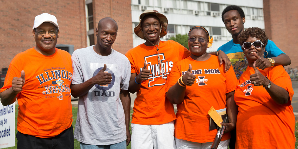 family giving thumbs up during an Illinois visit