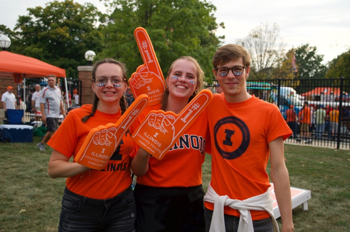 students celebrating their Illini Pride at a football game tailgate party
