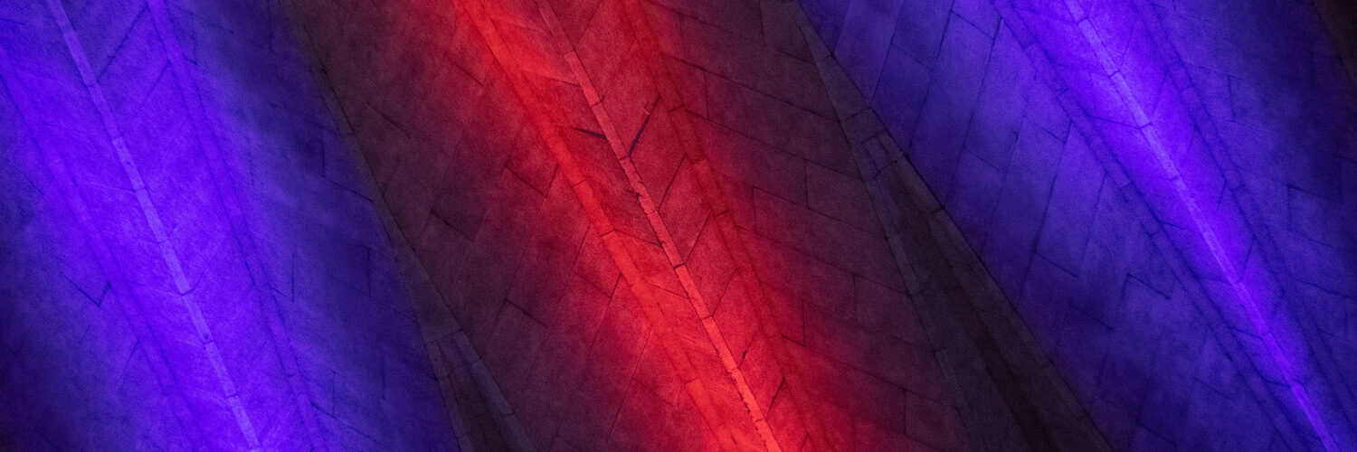 abstract of State Farm Center's roof with streaks of colored light