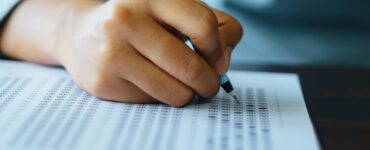 closeup of a student taking a scantron placement test