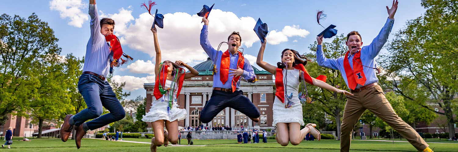 UIUC graduates celebrating with friends on the Quad