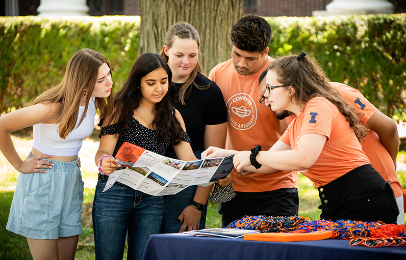 student wellness ambassadors helping direct prospective students visiting campus