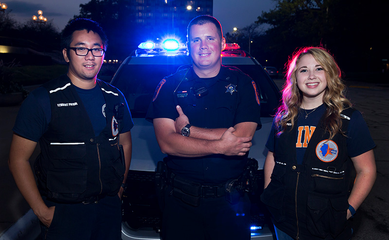 Student Patrol members with a CUPD officer