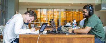 Students studying for finals week in the Electrical and Computer Engineering building.