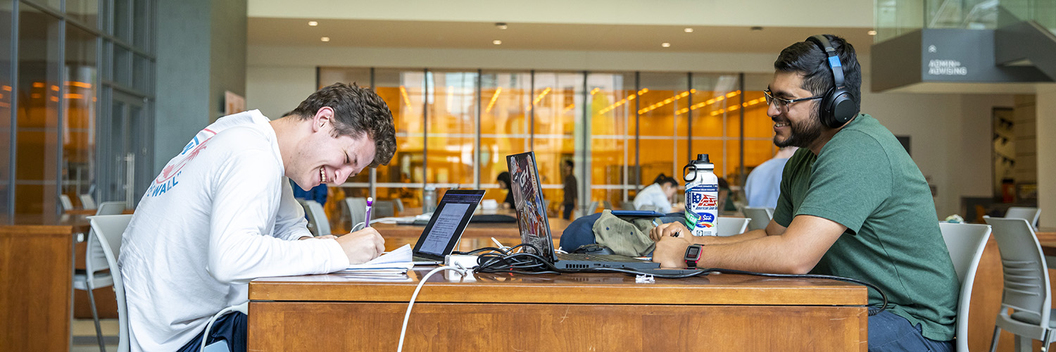 Students studying for finals week in the Electrical and Computer Engineering building.